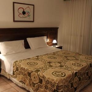 Camera Da Letto Matrimoniale Del Residence La Piscina di Isola del Gran Sasso a Teramo nella Valle Siciliana